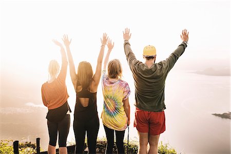 simsearch:649-08840317,k - Rear view of four young adult friends looking out over Lake Atitlan, Guatemala Photographie de stock - Premium Libres de Droits, Code: 649-08085486