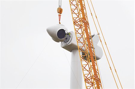 engineer efficiency - Wind turbine being erected Stock Photo - Premium Royalty-Free, Code: 649-08085544