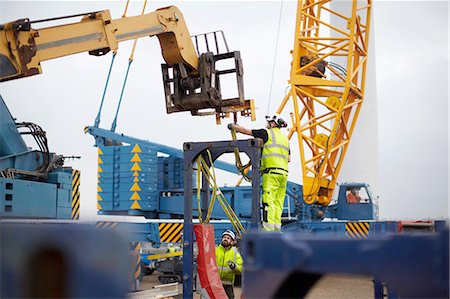 engineers inspecting at construction site - Engineers working at wind farm Stock Photo - Premium Royalty-Free, Code: 649-08085553