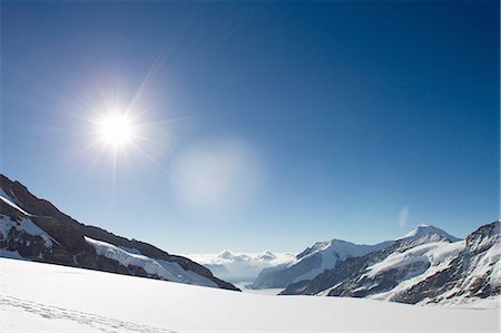 simsearch:649-08328454,k - View of snow covered mountain landscape, Jungfrauchjoch, Grindelwald, Switzerland Stock Photo - Premium Royalty-Free, Code: 649-08085714