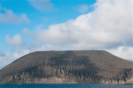 revillagigedo island - View of San Benedicto Island with ash formation along the crater of its inactive volcano, Revillagigedo, Mexico Stock Photo - Premium Royalty-Free, Code: 649-08085826