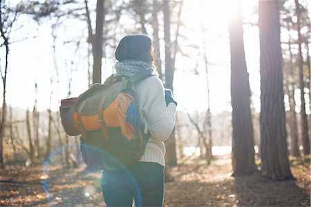 simsearch:649-09251794,k - Rear view of mature woman hiking in forest Photographie de stock - Premium Libres de Droits, Code: 649-08086083