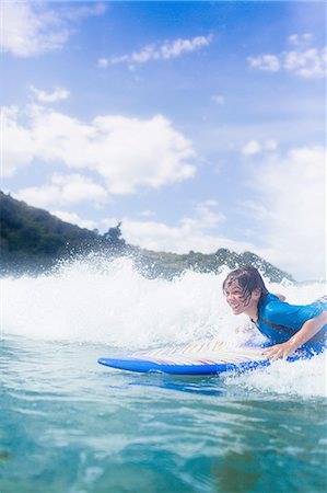 simsearch:649-08894785,k - Boy surfer riding the wave Stockbilder - Premium RF Lizenzfrei, Bildnummer: 649-08086239