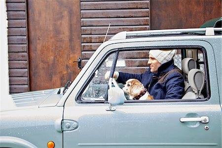 dog picture owner - Mid adult man with dog driving van Stock Photo - Premium Royalty-Free, Code: 649-08086964