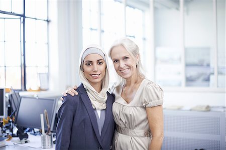 religious - Portrait of young and mature businesswomen in office Stock Photo - Premium Royalty-Free, Code: 649-08117902
