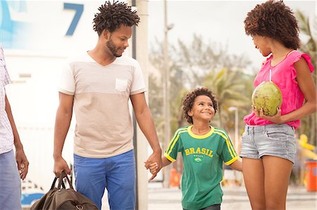 Grandfather and family strolling at Ipanema Beach, Rio De Janeiro, Brazil Stock Photo - Premium Royalty-Free, Code: 649-08117985