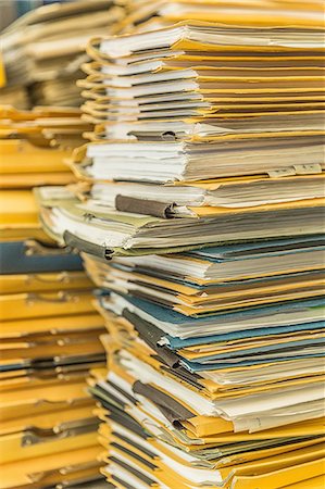 paper stacked - Stacks of paper files Stock Photo - Premium Royalty-Free, Code: 649-08118193