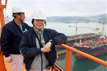 supervising - Portrait of workers at shipping port, GoSeong-gun, South Korea Stock Photo - Premium Royalty-Free, Code: 649-08118244