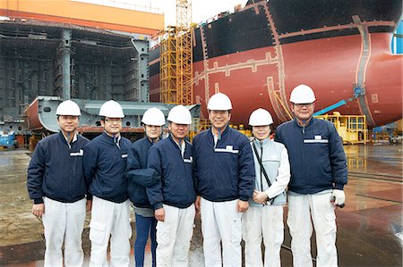 shipping - Portrait of workers at shipyard, GoSeong-gun, South Korea Stock Photo - Premium Royalty-Free, Code: 649-08118252