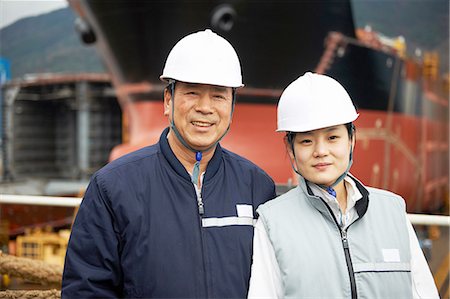 simsearch:649-08118274,k - Portrait of workers at shipyard, GoSeong-gun, South Korea Stock Photo - Premium Royalty-Free, Code: 649-08118275