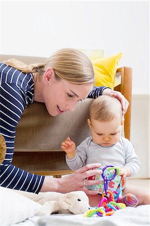 simsearch:649-08118903,k - Mother and baby girl, at home, playing together Stock Photo - Premium Royalty-Free, Code: 649-08118721