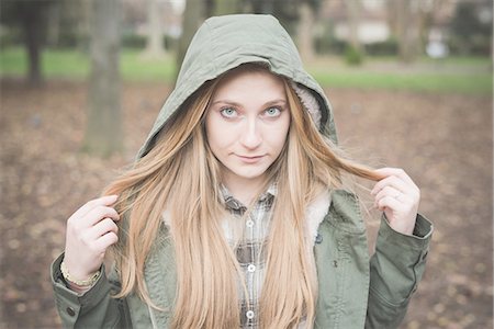 Young woman in park Stock Photo - Premium Royalty-Free, Code: 649-08125254