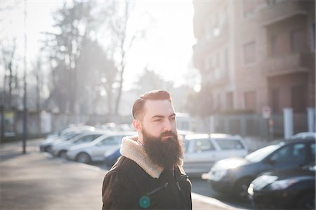 simsearch:649-08125291,k - Young bearded man on street Stock Photo - Premium Royalty-Free, Code: 649-08125295