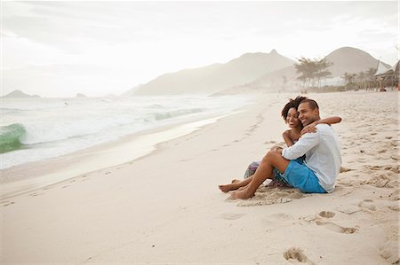simsearch:649-08125413,k - Couple sitting on beach, Rio De Janeiro, Brazil Stock Photo - Premium Royalty-Free, Code: 649-08125396