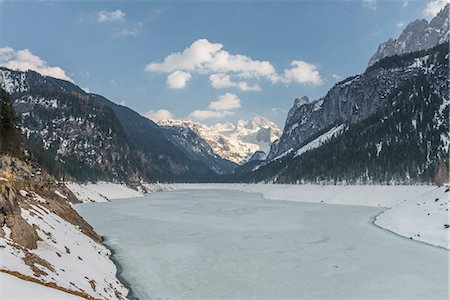 simsearch:649-08328454,k - Elevated view of frozen lake and snow covered mountains, Gosausee, Austria Stock Photo - Premium Royalty-Free, Code: 649-08125668