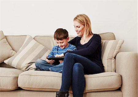 simsearch:649-09208789,k - Young boy using digital tablet with mother Stock Photo - Premium Royalty-Free, Code: 649-08125804