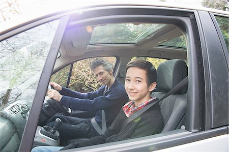 sweaters - Portrait of mature man and teenage son driving a car Stock Photo - Premium Royalty-Free, Code: 649-08125959