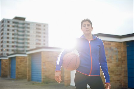 simsearch:649-08144368,k - Portrait of mature female basketball player holding ball Stock Photo - Premium Royalty-Free, Code: 649-08144364