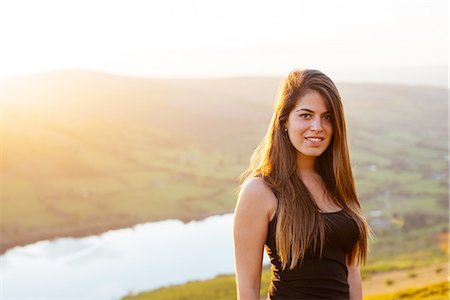 simsearch:649-08144840,k - Portrait of young woman, Talybont Reservoir in Glyn Collwn valley, Brecon Beacons, Powys, Wales Stock Photo - Premium Royalty-Free, Code: 649-08144842
