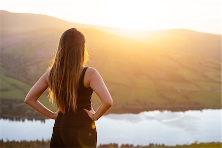 simsearch:649-08144840,k - Rear view of young woman looking out over Talybont Reservoir in Glyn Collwn valley, Brecon Beacons, Powys, Wales Stock Photo - Premium Royalty-Free, Code: 649-08144843