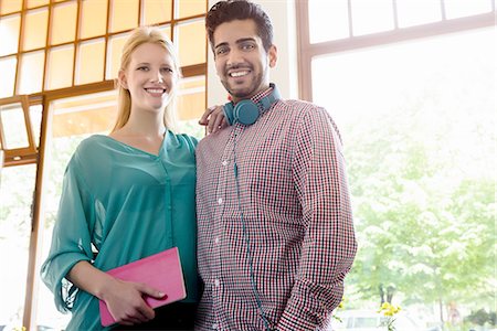 Portrait of young couple in cafe Stock Photo - Premium Royalty-Free, Code: 649-08144883