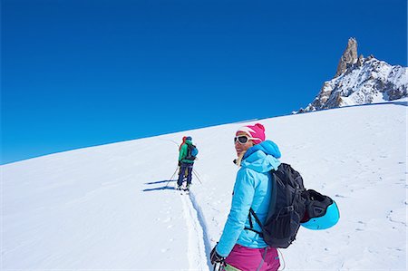 Mature female skier looking out from Mont Blanc massif, Graian Alps, France Photographie de stock - Premium Libres de Droits, Code: 649-08144974