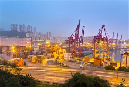 Cargo containers and loading cranes illuminated at night, Hong Kong, China Foto de stock - Sin royalties Premium, Código: 649-08145243