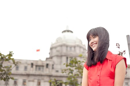 simsearch:649-08145347,k - Portrait of young woman, outdoors, Shanghai, China Stock Photo - Premium Royalty-Free, Code: 649-08145354