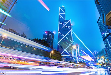 futuristic architecture - Central Hong Kong business district: skyline with Bank of China building and light trails at dusk, Hong Kong, China Stock Photo - Premium Royalty-Free, Code: 649-08145400