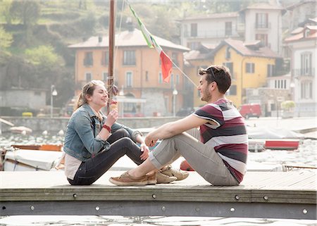 simsearch:649-08117856,k - Couple sitting on pier eating ice cream cone at lake Mergozzo, Verbania, Piemonte, Italy Stockbilder - Premium RF Lizenzfrei, Bildnummer: 649-08145629