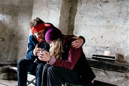 simsearch:614-06442497,k - Young couple hiking, in shelter for rest, Honister Slate Mine, Keswick, Lake District, Cumbria, United Kingdom Stock Photo - Premium Royalty-Free, Code: 649-08179993