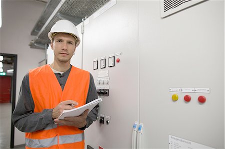 engineer at industry control room - Portrait of young male engineer in technical room Stock Photo - Premium Royalty-Free, Code: 649-08180025