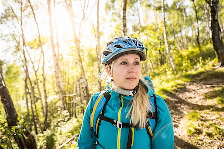 simsearch:649-09123280,k - Young woman riding mountain bike through woods, Lake Como, Italy Stockbilder - Premium RF Lizenzfrei, Bildnummer: 649-08180215
