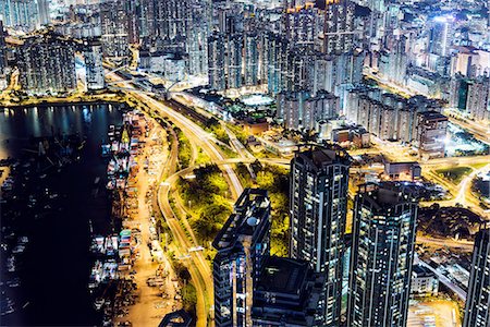 Aerial of Kowloon at night, with light trails, Hong Kong, China Foto de stock - Sin royalties Premium, Código: 649-08180332