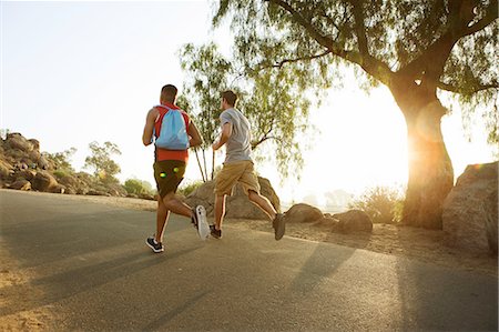 simsearch:649-06829432,k - Two male friends running, outdoors, rear view Stock Photo - Premium Royalty-Free, Code: 649-08238183