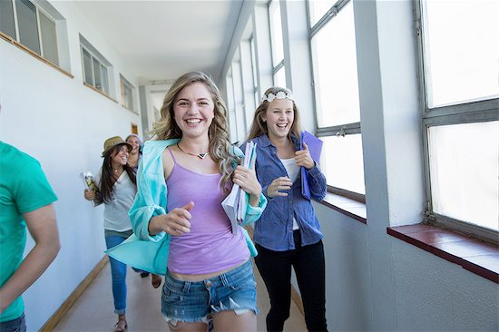 Students running down hallway, laughing Stock Photo - Premium Royalty-Free, Image code: 649-08238292