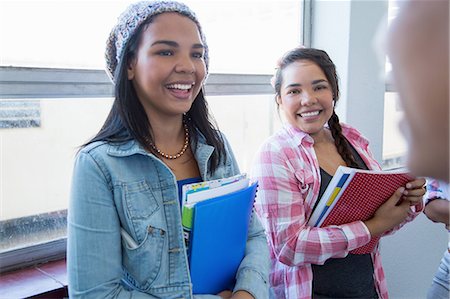 simsearch:632-01156768,k - Students standing by window, chatting Stock Photo - Premium Royalty-Free, Code: 649-08238307