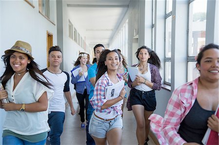 Students running down hallway, laughing Stock Photo - Premium Royalty-Free, Code: 649-08238302