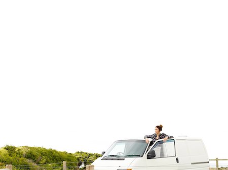 simsearch:862-08272896,k - Young woman looking out from camper van, Point Addis, Anglesea, Victoria, Australia Foto de stock - Sin royalties Premium, Código: 649-08238450