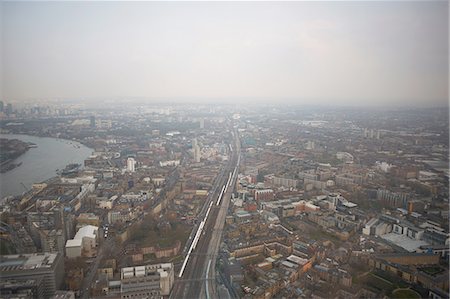 Aerial cityscape of river Thames and city, London, England, UK Stock Photo - Premium Royalty-Free, Code: 649-08238497