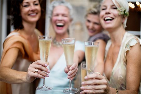 elegant and seniors - Elegant mature women toasting in urban garden Stock Photo - Premium Royalty-Free, Code: 649-08238931