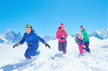 skiing mountain - Family having snowball fight, Chamonix, France Stock Photo - Premium Royalty-Free, Code: 649-08232469