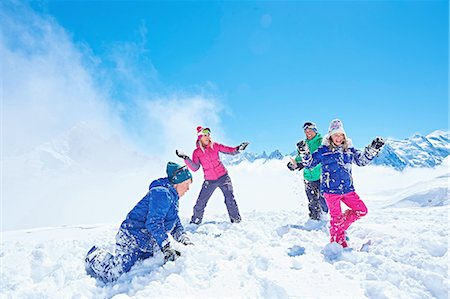 dads playing sports with kids - Family having snowball fight, Chamonix, France Stock Photo - Premium Royalty-Free, Code: 649-08232471