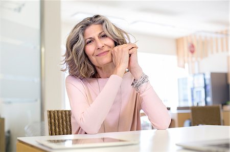 silver hair smile alone - Portrait of senior female designer in office Stock Photo - Premium Royalty-Free, Code: 649-08306362