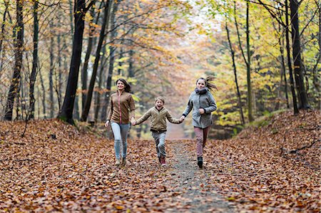 simsearch:649-08306781,k - Girls running in autumn forest Stock Photo - Premium Royalty-Free, Code: 649-08306777
