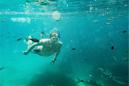 plongeur en apnée - Underwater view of mature man snorkeling, Menorca, Balearic islands, Spain Photographie de stock - Premium Libres de Droits, Code: 649-08307499
