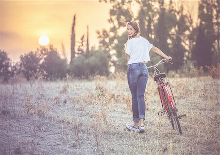 sardinia rural - Girl walking her bike in countryside, Quartucciu, Sardinia, Italy Stock Photo - Premium Royalty-Free, Code: 649-08327505