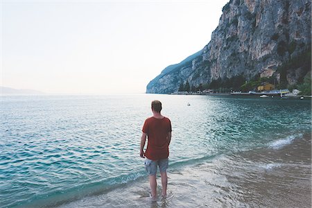 simsearch:841-07082270,k - Man enjoying view of Lake Garda, Italy Stock Photo - Premium Royalty-Free, Code: 649-08327638