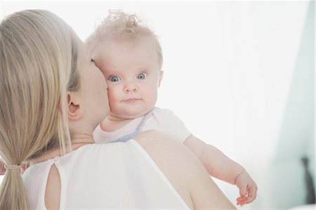 simsearch:649-08118903,k - Mother kissing baby daughter Stock Photo - Premium Royalty-Free, Code: 649-08327695