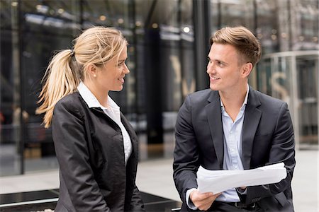 Businessman and businesswoman meeting outside office building, London, UK Stock Photo - Premium Royalty-Free, Code: 649-08327826